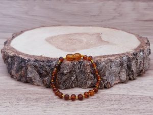 Bracelet pour bébé en perles naturelles, Ambre cognac